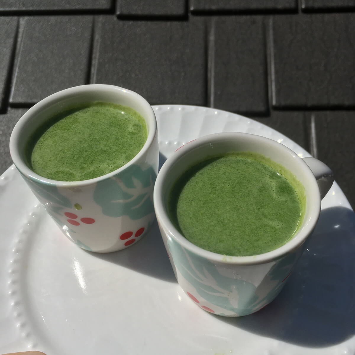 green juice in espresso mugs